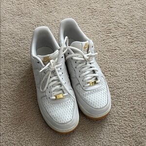 Nike White Sneakers with Breathable Material and Light Rubber Sole